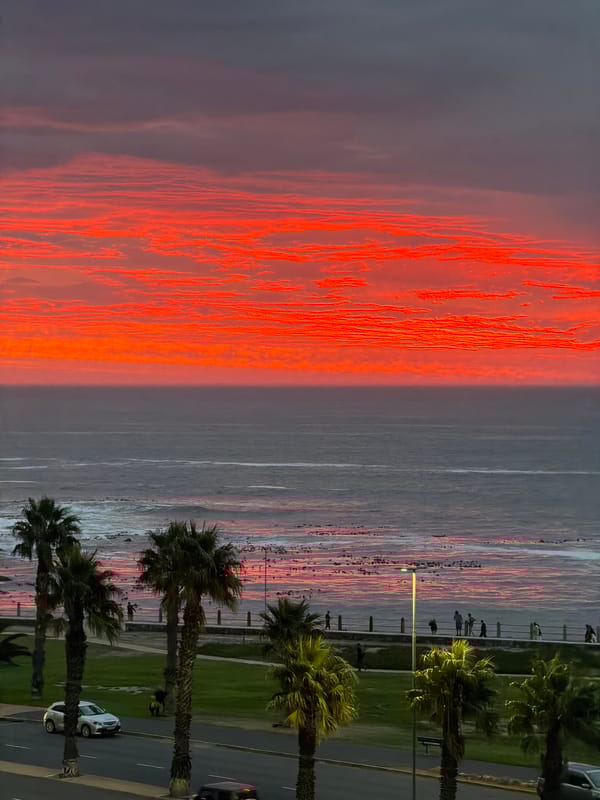 Cape Town witnesses capture sunset, vehicles, and apparent fire