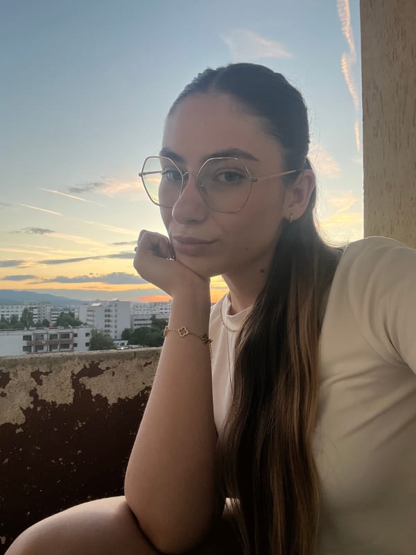 Balcony selfie session at golden hour overlooking the city