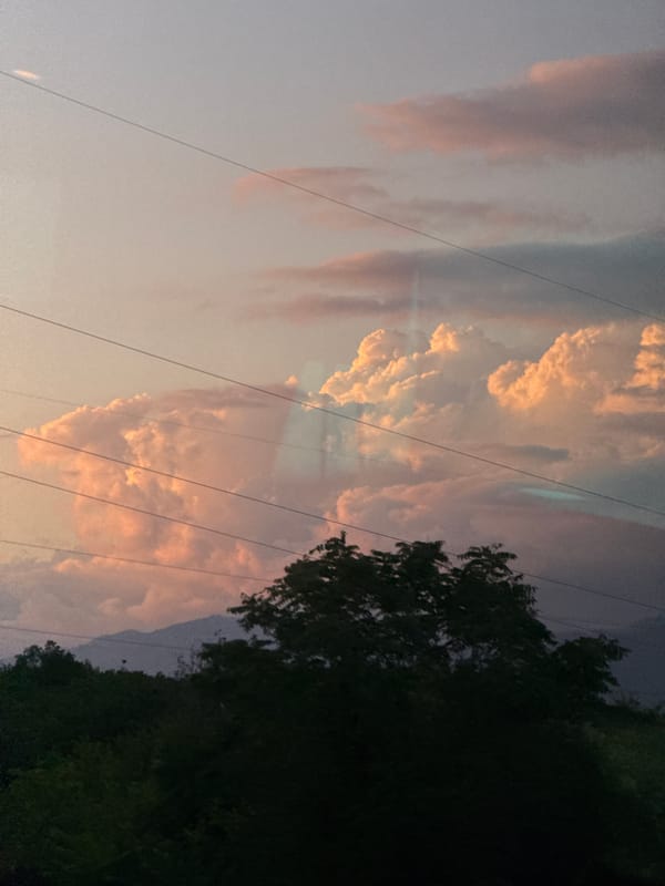 Sunset captured over mountainous landscape near Podgorica, Montenegro