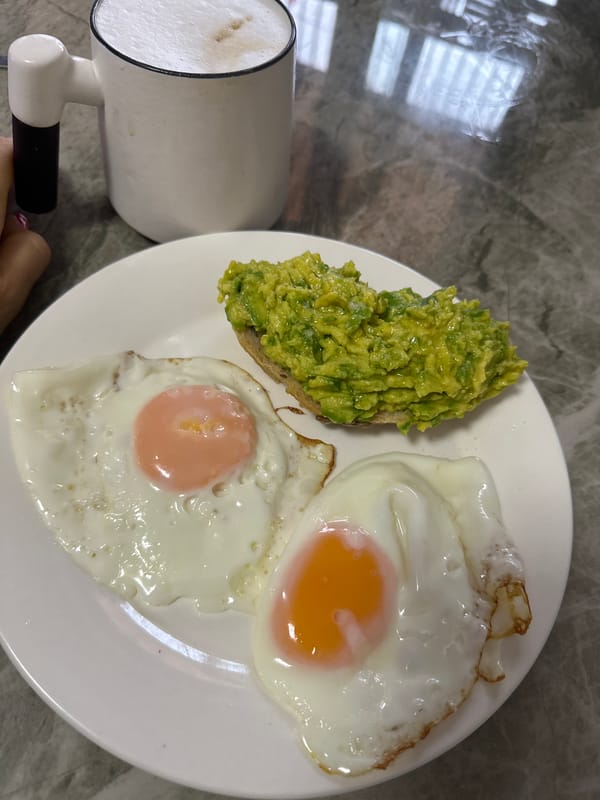 Morning routine captured in Nha Trang: breakfast, pets, rain