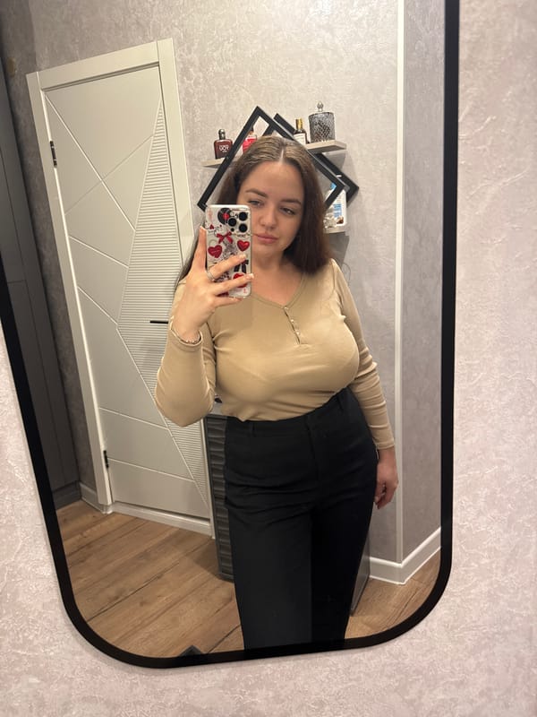 Woman takes mirror selfie in Yakhroma, Russia