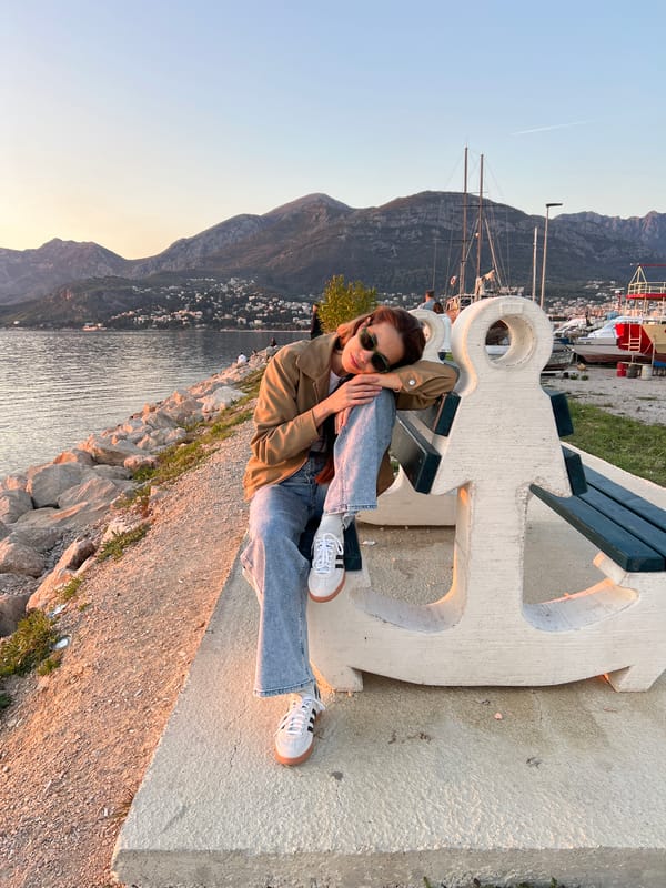 Woman explores Bar Montenegro marina and waterfront attractions