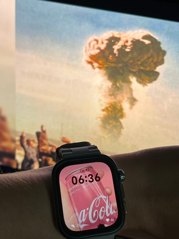 Smartwatch, nuclear cloud backdrop, and a plush lamb in St. Petersburg
