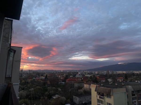 Dramatic sunset illuminates Sofia skyline, witnessed citywide