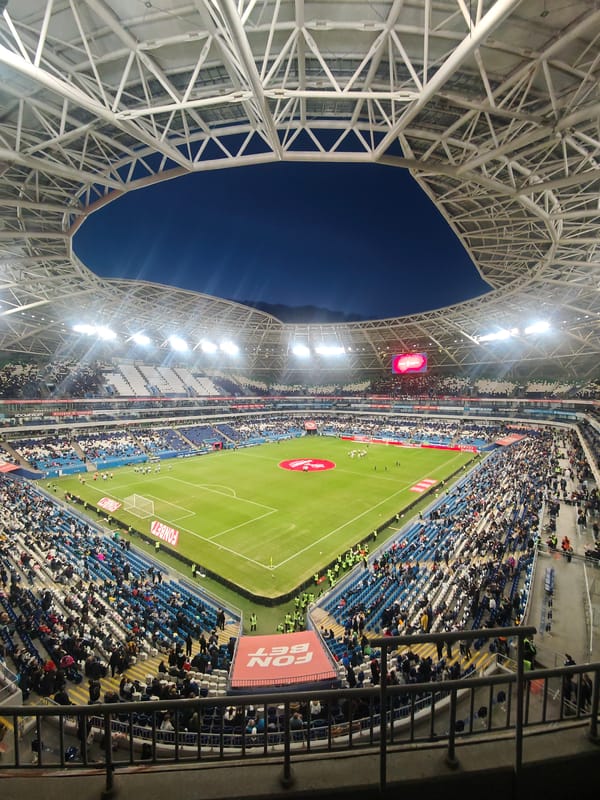 Nighttime soccer match draws packed crowd in Novokuybyshevsk stadium