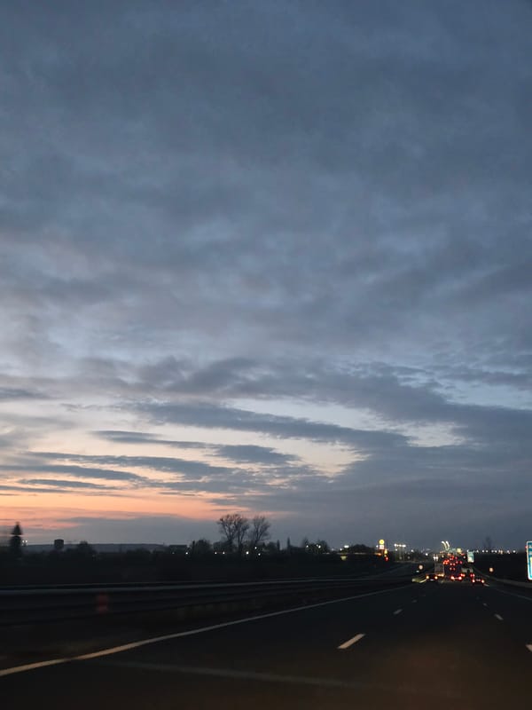 Dawn traffic flows on Sofia highway