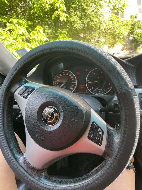 Women photograph themselves inside BMW in Sofia