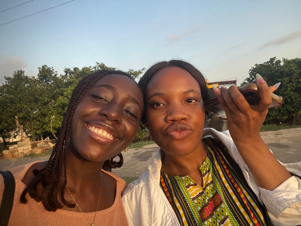 Friends capture selfies during golden hour in Karum, Nigeria