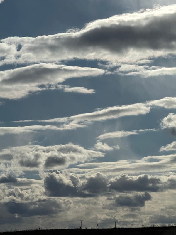 Parallel cloud bands observed over Kuyeda, Russia