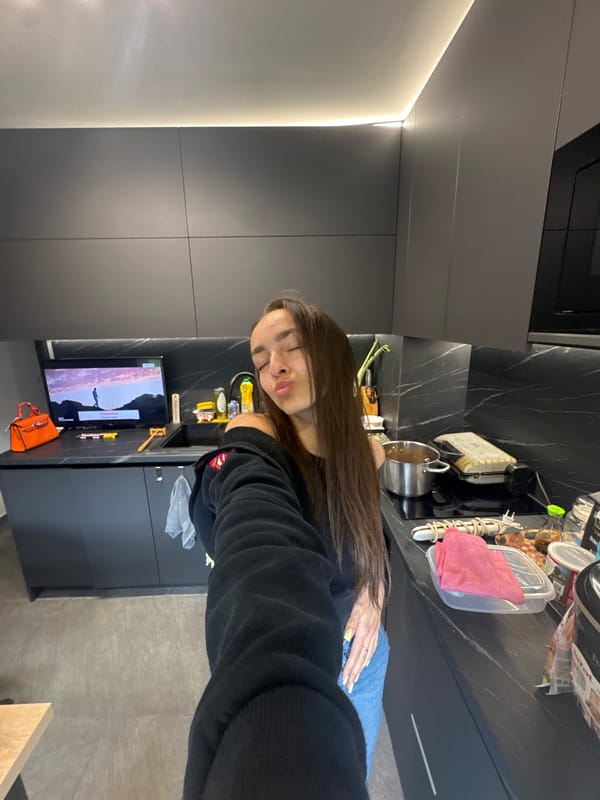 Woman takes selfie in Sofia kitchen