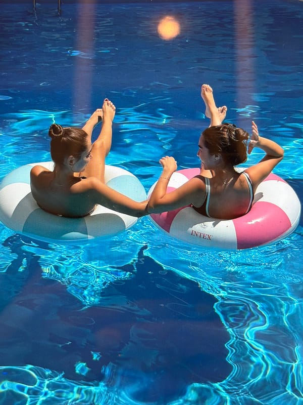 Pool floats and a dusty sunset window in Odesa