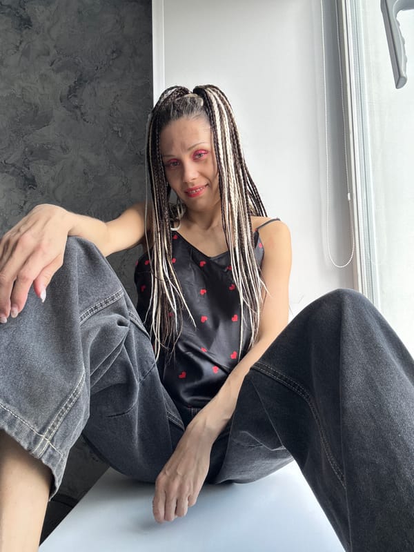 Woman poses for indoor photo session in Rusanovo residence