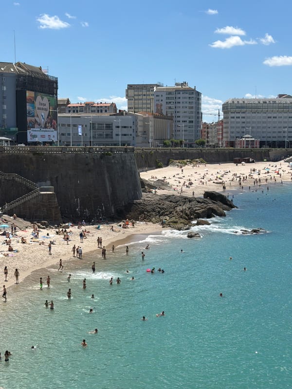 Beach crowds and clifftop yoga on a sunny A Coruña morning