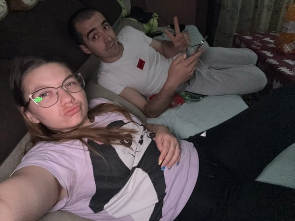 Couple relaxes at home watching TV in Sofia apartment