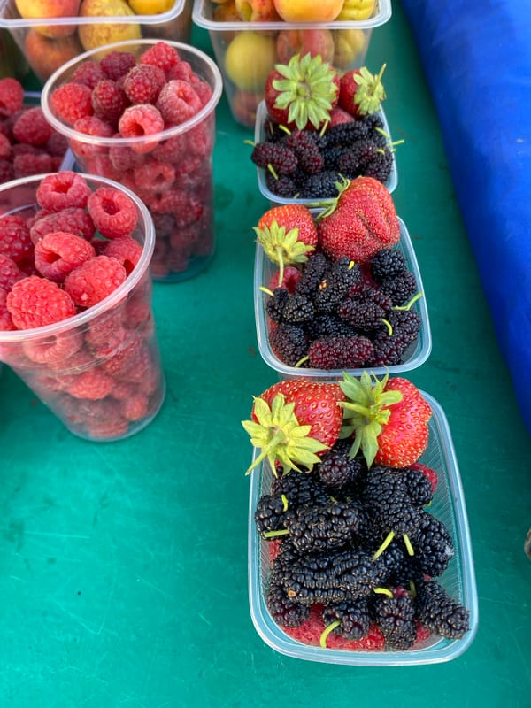 Summer fruit and veg on display at a Kushchovskaya market