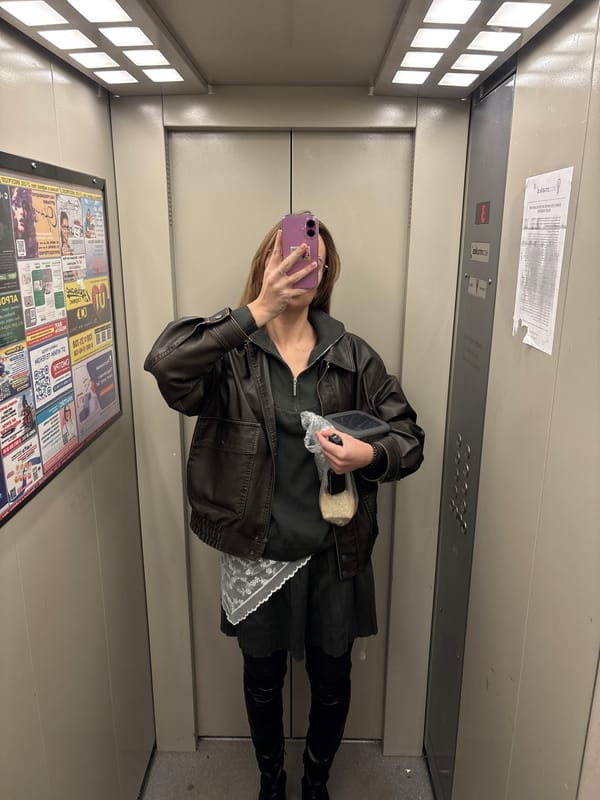 Woman takes elevator selfies in Ust-Ilimsk, Russia