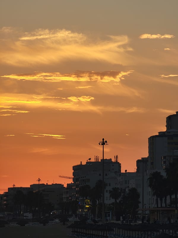 Quarteira beach at sunset, golden hour to dusk