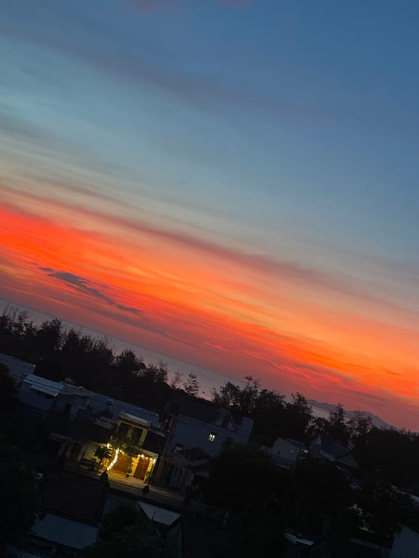 Dusk settles over Hoi An's coastline from multiple vantage points