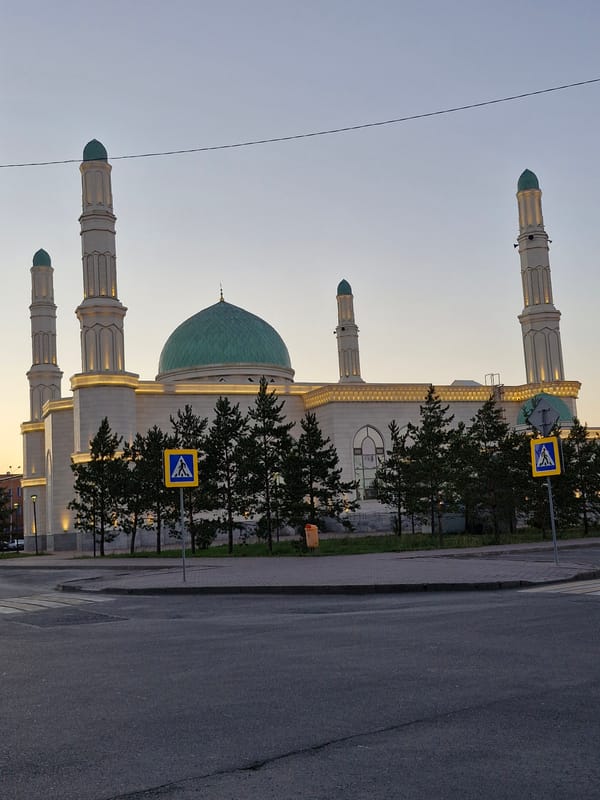 Hazrat Sultan Mosque in Astana glowing at dusk