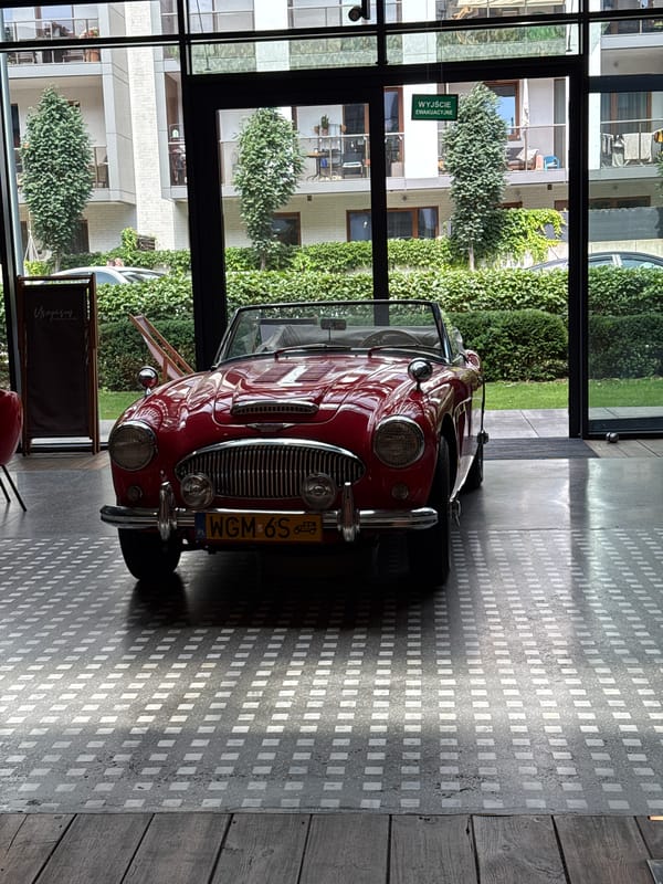 Vintage convertible and piano in a Warsaw indoor venue