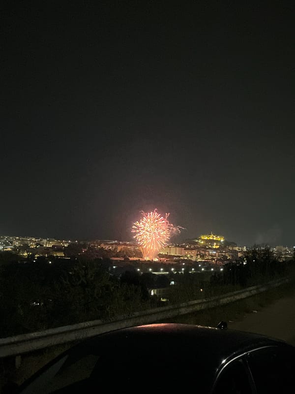 Fireworks over La Pedrera at night, viewed from above