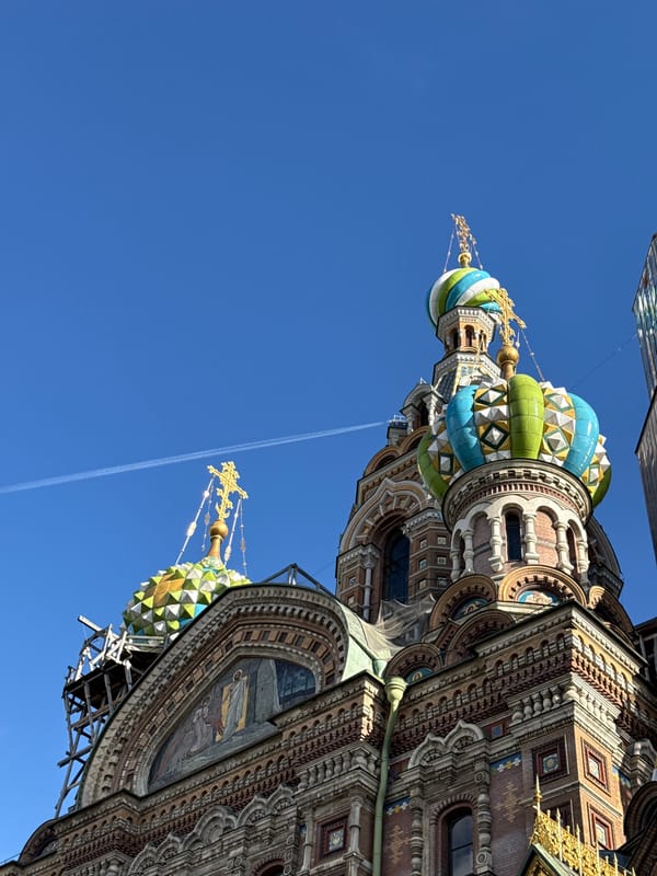 Sunny afternoon boat cruise through central Saint Petersburg