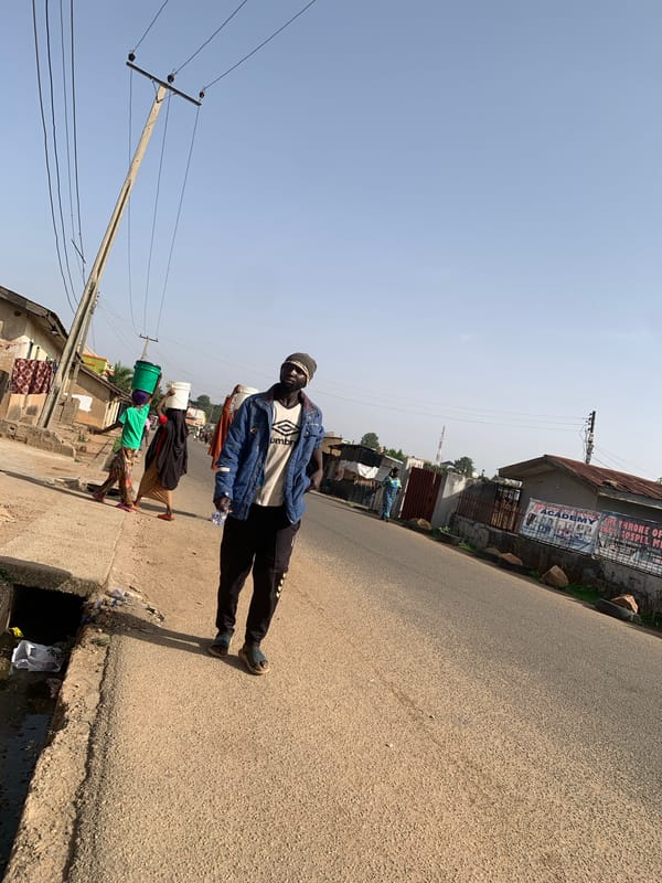 Morning street life documented across Jos, Nigeria neighborhoods