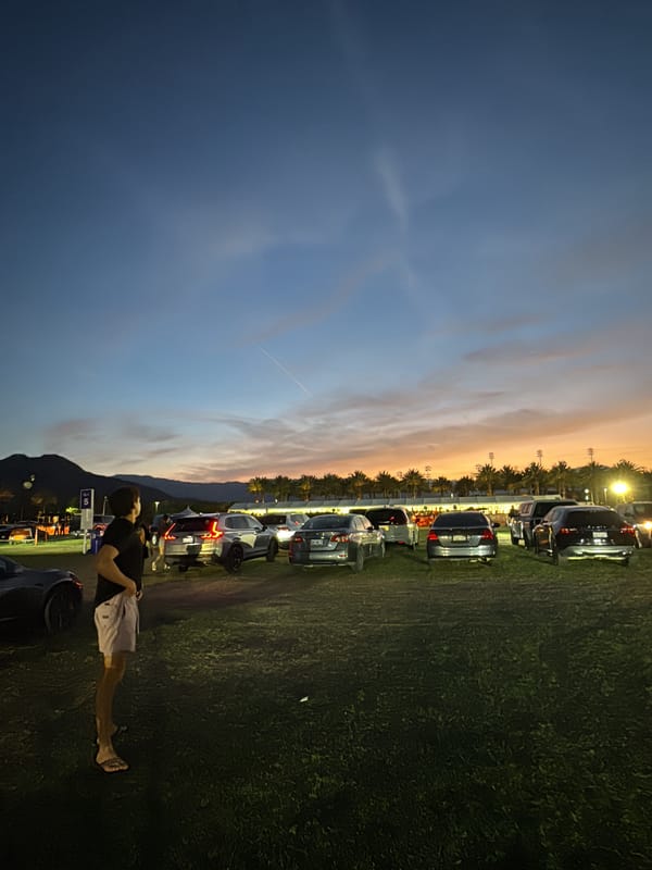 Sunset observed over crowded parking area in Indian Wells