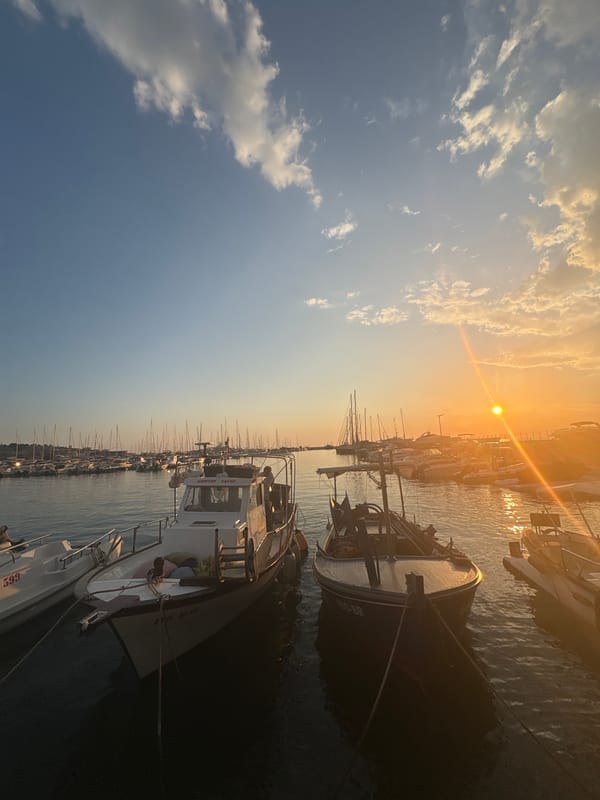 Golden hour settling over Bar's harbor in Montenegro