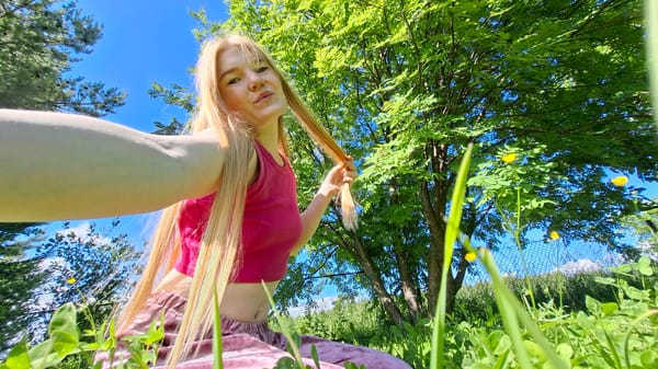 Woman conducts extended outdoor photo session in Russian village