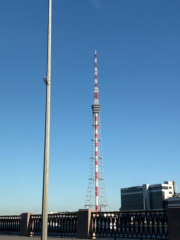 Red striped TV tower photographed in Saint Petersburg