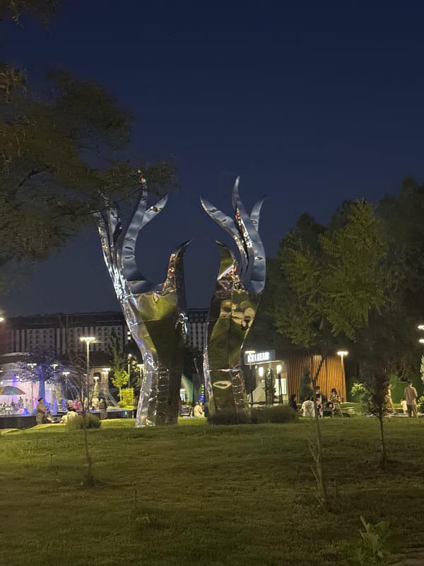 Tashkent after dark: park sculptures and metro life