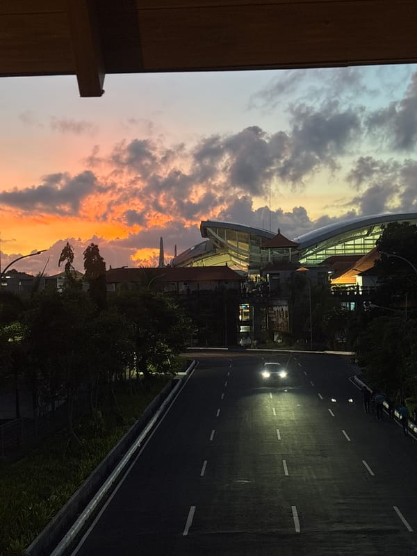 Twilight scenes captured at roadside structure in Kuta, Indonesia
