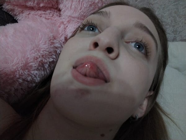 Woman takes selfies at home in Saratov, Russia