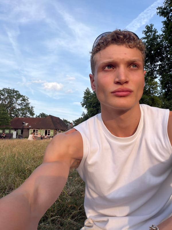 Casual selfie moment in London, summer evening.