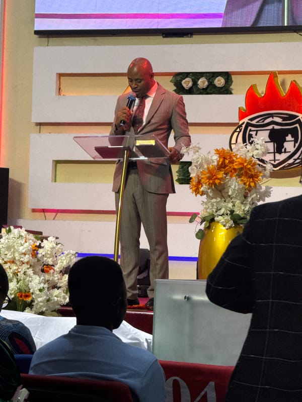 Religious gathering with speakers and attendees in Nigeria
