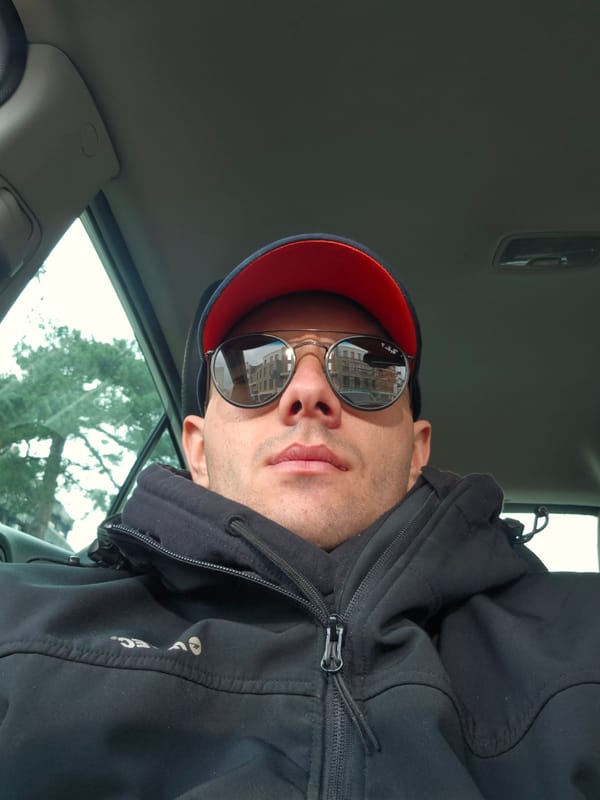 Man in hooded jacket photographed in Dupnitsa, Bulgaria