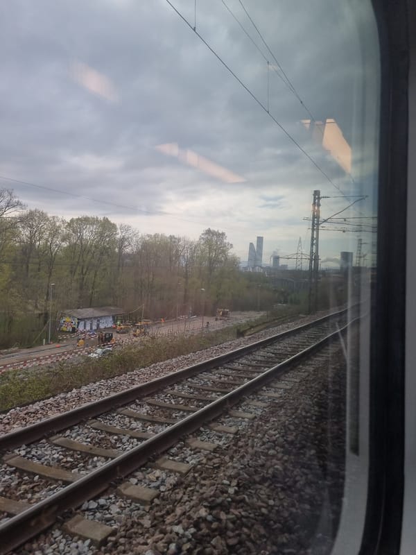 Train passenger views railway construction activity near Basel