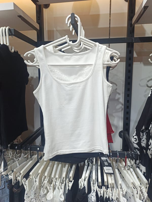 Browsing clothes and coffee in a Shymkent boutique