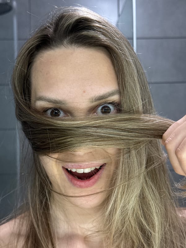 Woman photographed in playful tilted poses in Chaikovsky, Russia