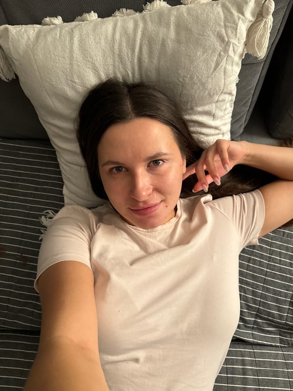 Woman photographed at home with cat in Odintsovo