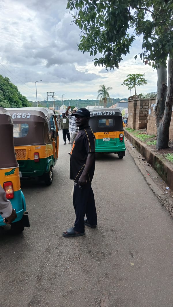 Ordinary afternoon life documented across Jos, Nigeria under overcast skies