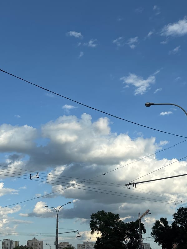 Afternoon street life across central Minsk on a clear summer day