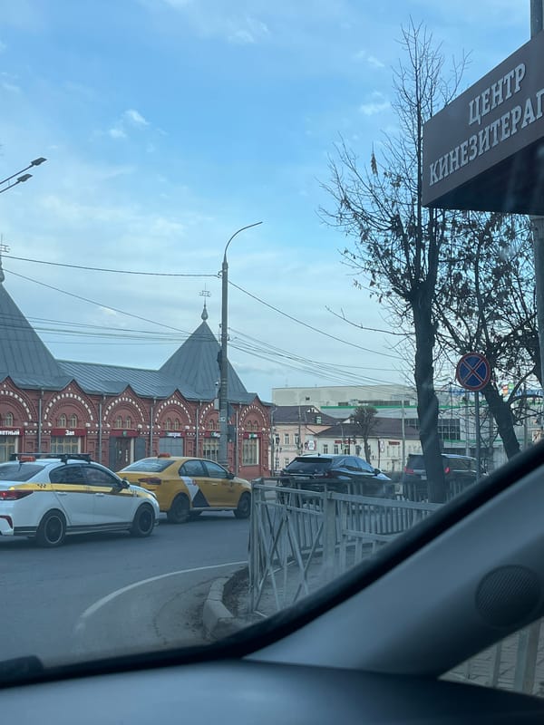 Vehicle passenger documents routine street scenes in Klin, Russia