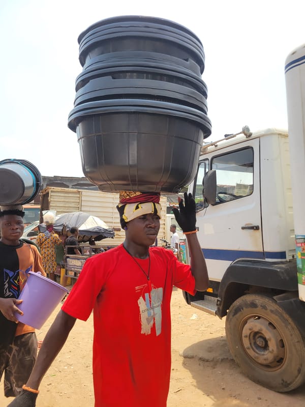Daily street life documented in Onitsha Nigeria commercial district