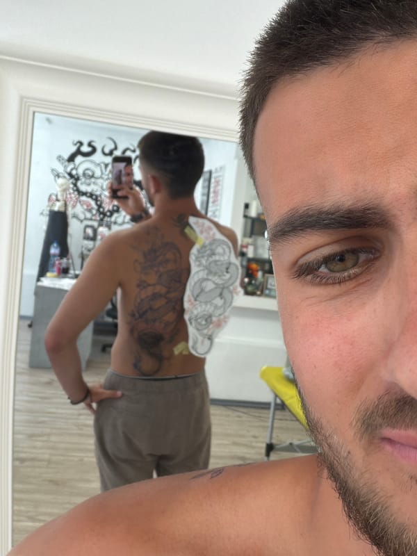 Dragon and cherry blossom back tattoo taking shape in Burgas