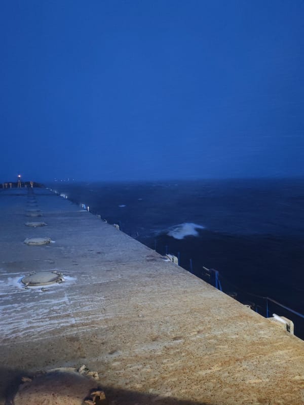 Ship passenger documents nighttime voyage near Shcheleiki, Russia