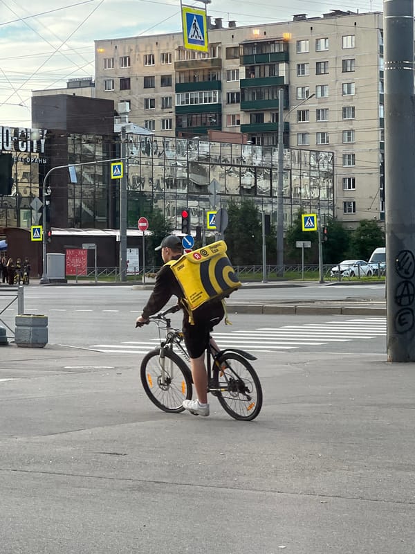 Afternoon street life and cafe interiors in Sinyavino, Russia