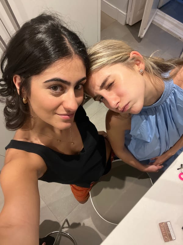 Friends gather for casual pasta dinner in Madrid kitchen