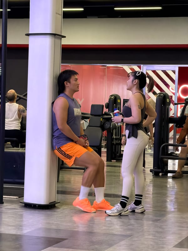 Gym session underway at a neon-lit fitness space in Nong Pa Khrang